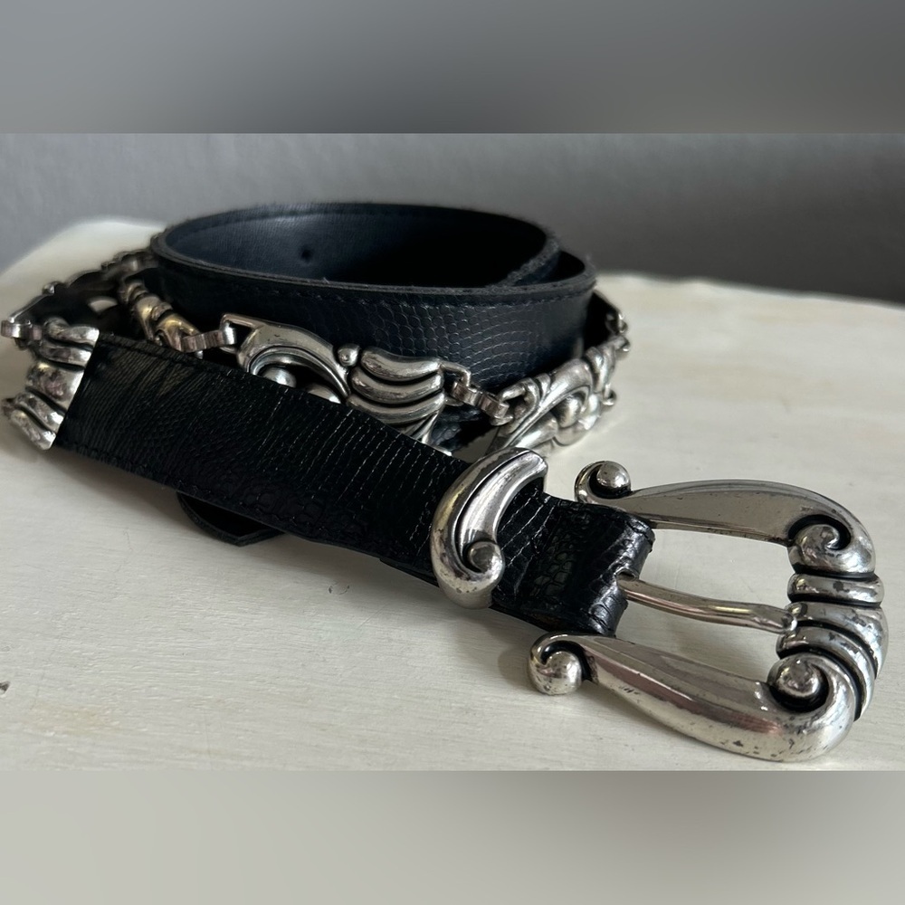 Brighton black leather belt with silver accents. Womens size small.